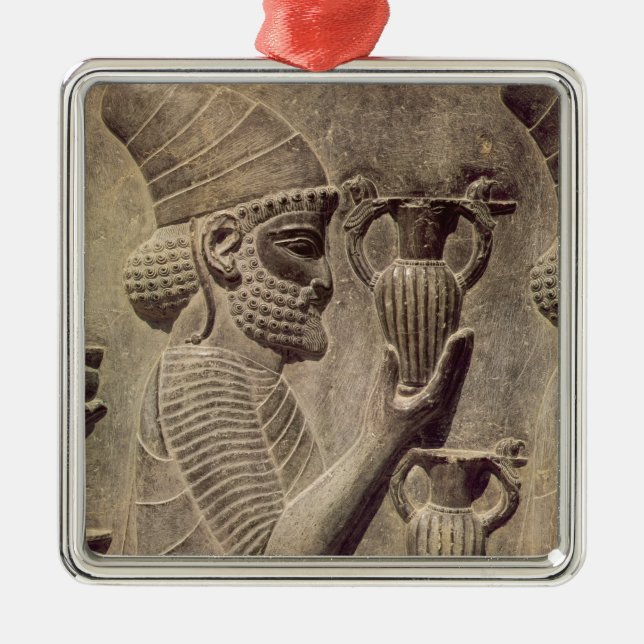 Phoenician carrying two offering, detail relief metal tree decoration (Front)