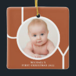 Photo Baby's First Christmas Rust Photo Ceramic Ornament<br><div class="desc">This stylish Baby's First Christmas Photo Ornament is decorated with the word JOY in white on a rust terracotta background.
Easily customisable with your photo and name.
Suitable for a boy or a girl.</div>