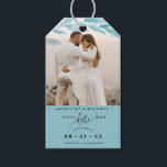 Photo, Dusty Blue Leaves Wedding Save the Date Gift Tags<br><div class="desc">Delight your guests announcing your wedding date with a gift; they will love hearing the news and enjoy the nice detail! Photo gift tag with attractive watercolor dusty blue coloured leaves photo overlay on the top framing your photograph. Dusty blue section on the bottom with modern hand written calligraphy details,...</div>