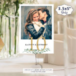 Photo Greenery Gold Wedding Table Number Sign<br><div class="desc">Modern botanical greenery wedding reception table number sign featuring one or two photos of the couple (engagement photos or dating pictures through the years) for entertaining wedding guests as well as identifying tables. Duplicated on both sides for two-sided viewing. CHANGES: The gold and black text colours can be changed to...</div>