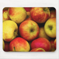 Photo of a Bushel Of Yellow and Red Apples