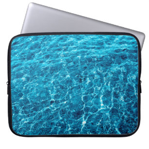 Photo of a macro bubbling blue clear sea water laptop sleeve