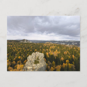 photo of a mountainous autumn forest, mountains,  holiday postcard