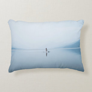 PHOTO OF PERSON ON CALM BODY OF WATER DECORATIVE CUSHION