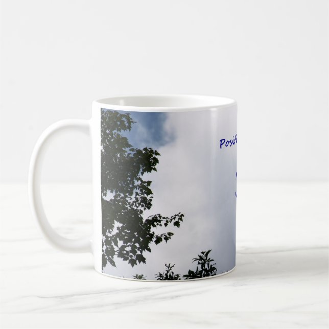 Photo of sky and clouds created into a coffee mug (Left)