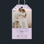 Photo, Pale Purple Leaves Wedding Save the Date Gift Tags<br><div class="desc">Delight your guests announcing your wedding date with a gift; they will love hearing the news and enjoy the nice detail! Photo gift tag with attractive watercolor purple lavender coloured leaves photo overlay on the top framing your photograph. Pale purple section on the bottom with modern hand written calligraphy details,...</div>