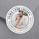Photo Wedding Save The Date Classic Round Sticker<br><div class="desc">Save The Date Custom Wedding Stickers with Photo Design. These trendy stickers feature "Save The Date" at the top in an elegant handwritten script font, with the bride and groom's names and wedding date displayed at the bottom in a petite serif font for a sophisticated touch. The centerpiece of the...</div>