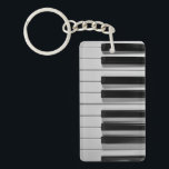 Piano Keyboard Custom Key Chain<br><div class="desc">Whether you are a piano virtuoso or someone who can barely play Chopsticks,  you are sure to love this black and white Piano Keyboard Custom Key Chain.</div>