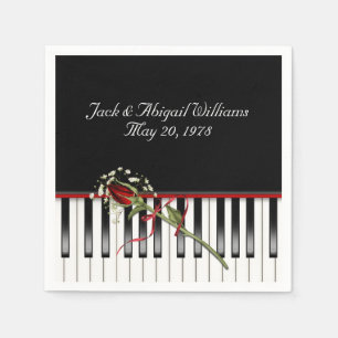 piano keyboard with red rose anniverary napkin