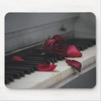 Piano Keys with a Red Rose