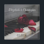 Piano Keys with a Red Rose Wedding Magnet<br><div class="desc">Artistic looking photo of an old piano focusing on the old yellowing keys with a faded red rose sitting on the keys and a few loose petals scattered about. This image has a somewhat melancholy and sentimental mood with a little bit of a nostalgic feel. Customise with the bride and...</div>