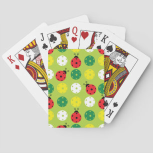 Pickleball ladybugs and picklaballs on fresh green playing cards