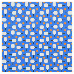 Pickleball Paddles with Orange Pickleball Balls on Fabric