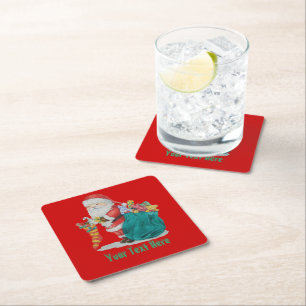 picture of santa sorting pressies for christmas square paper coaster