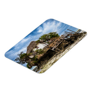 Picturesque house on a tropical coral outcrop magnet