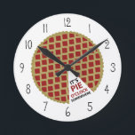 Pie Clock<br><div class="desc">A clock featuring featuring an illustration of a pie</div>