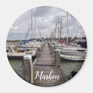 Pier with boats and yachts in Marken Netherlands Magnet