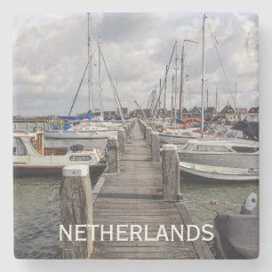 Pier with boats and yachts in Marken Netherlands Stone Coaster