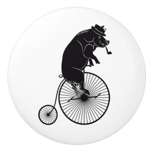 Pig or Hog Riding a Penny Farthing Bike Ceramic Knob