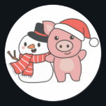 Pig With Snowman In Winter For Christmas Classic R Round Sticker<br><div class="desc">Pig with a snowman in winter for Christmas - a snowman for winter and Christmas. A winter greeting in the cold season for the holidays. Christmas pig with snowman.</div>