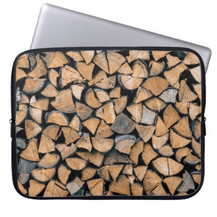 Pile of brown firewood laptop sleeve