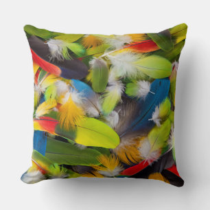 Pile of colourful feathers cushion
