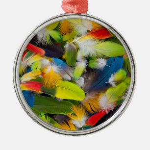 Pile of colourful feathers metal tree decoration