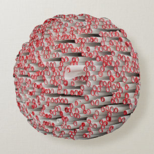 Pile of rolled papers round cushion