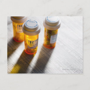 Pill bottles on stock page postcard