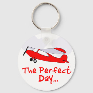 pilot flyling red aeroplane key ring