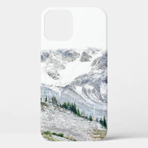 PINE TREES NEAR MOUNTAIN COVERED WITH SNOW iPhone 12 CASE