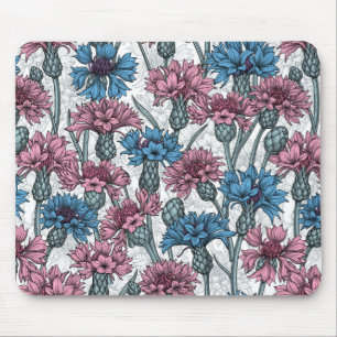 Pink and blue cornflowers, wild flowers on white mouse pad