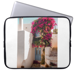 PINK AND GREEN PLANT ON WHITE CONCRETE WALL LAPTOP SLEEVE