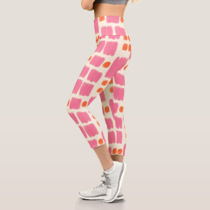 Pink and Orange painted shapes on a Cream backgrou Capri Leggings