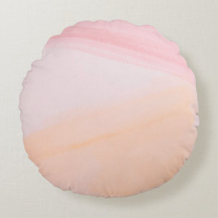 Pink and orange paints round cushion