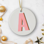 Pink and Orange Retro Typography Monogram Initial Ceramic Tree Decoration<br><div class="desc">Add a bold, vintage touch to your Christmas decor with this personalised monogram ceramic ornament, featuring a vibrant pink and orange retro typography design. Perfect for those who love a playful and nostalgic aesthetic, this ornament can be customised with your initials, making it a one-of-a-kind keepsake or a thoughtful holiday...</div>