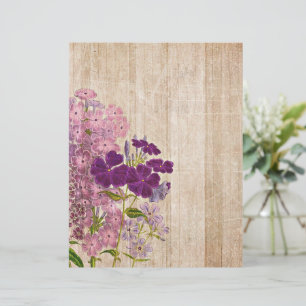 Pink and purple flowers on wood