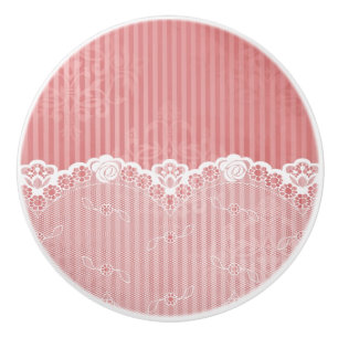 Pink and white background with black lace ceramic knob