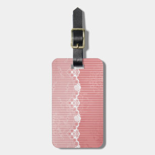 Pink and white background with black lace luggage tag