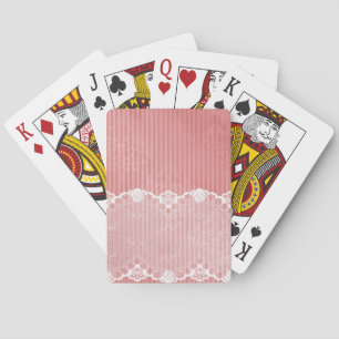 Pink and white background with black lace playing cards