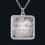 Pink and White Crab Apple Blossoms Wedding Silver Plated Necklace<br><div class="desc">The pretty Pink and White Crab Apple Blossoms Wedding Pendant Necklace makes a unique keepsake gift for the bride to be, her bridesmaids or bridal party. This elegant custom flowery wedding jewellery features a digitally painted floral photograph of white and pink crab apple flower blossoms on the tree inside a...</div>