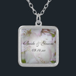 Pink and White Crab Apple Blossoms Wedding Silver Plated Necklace<br><div class="desc">The pretty Pink and White Crab Apple Blossoms Wedding Pendant Necklace makes a unique keepsake gift for the bride to be, her bridesmaids or bridal party. This elegant custom flowery wedding jewellery features a digitally painted floral photograph of white and pink crab apple flower blossoms on the tree inside a...</div>