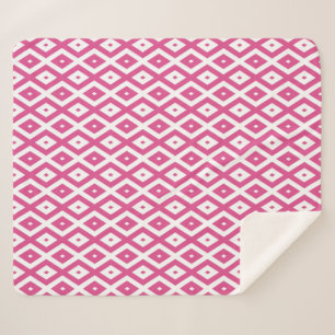 Pink and white diamond pattern sherpa blanket