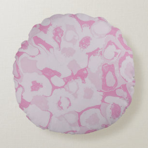 Pink and white floral textile round cushion