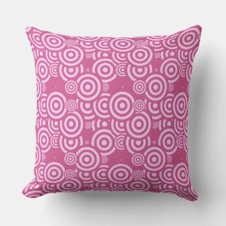 pink and white geometric cushion