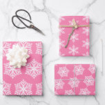 Pink and White Snowflakes Pattern Christmas Wrapping Paper Sheet<br><div class="desc">Wrap your Christmas gifts with this festive pink wrapping paper with white snowflakes patterns.</div>