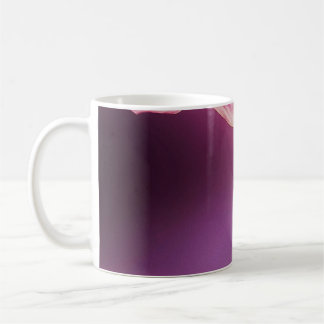 Pink and yellow flower on pink paper coffee mug
