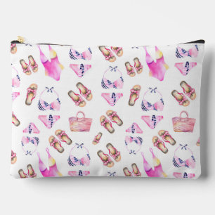 PINK BATHING SUITS FLIP FLOPS AND BEACH BAGS