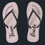 Pink Black Name Bride Bridal Party Bachelorette Jandals<br><div class="desc">A simple black and pink minimalist typography design for a bridal shower, bachelorette party or beach wedding. The text is customisable and can be personalised with your own name and bride slogan. For example, Bride Squad instead of Team Bride, Bride repeated on the left and right foot, or something else....</div>