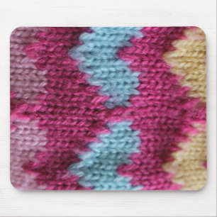 pink, blue and yellow knitting mouse pad